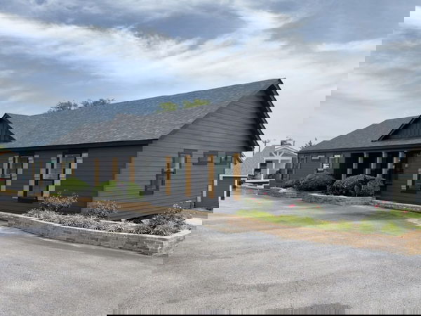 The riverwalk hero, elevation, and exterior home features